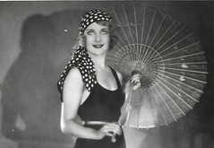 A parasol, smile and swimsuit for Sennett